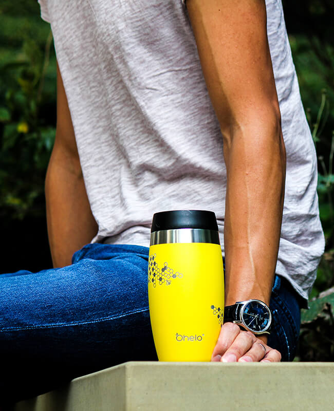 Ohelo leakproof coffee cup in yellow with honeycomb and bee design