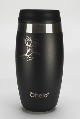 Rotational video of Ohelo leakproof reusable coffee cup in black with laser etched cherry blossom design